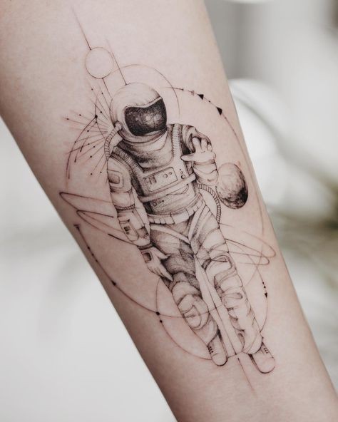 small astronaut tattoo concepts