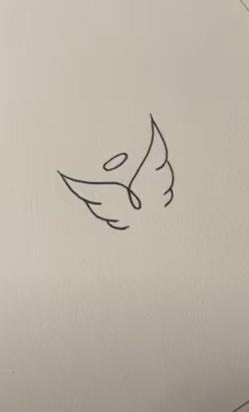 Small baby angel tattoo designs 0048