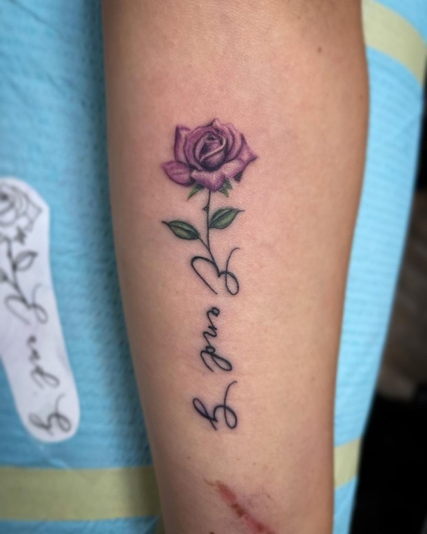 Small black rose tattoo 0013