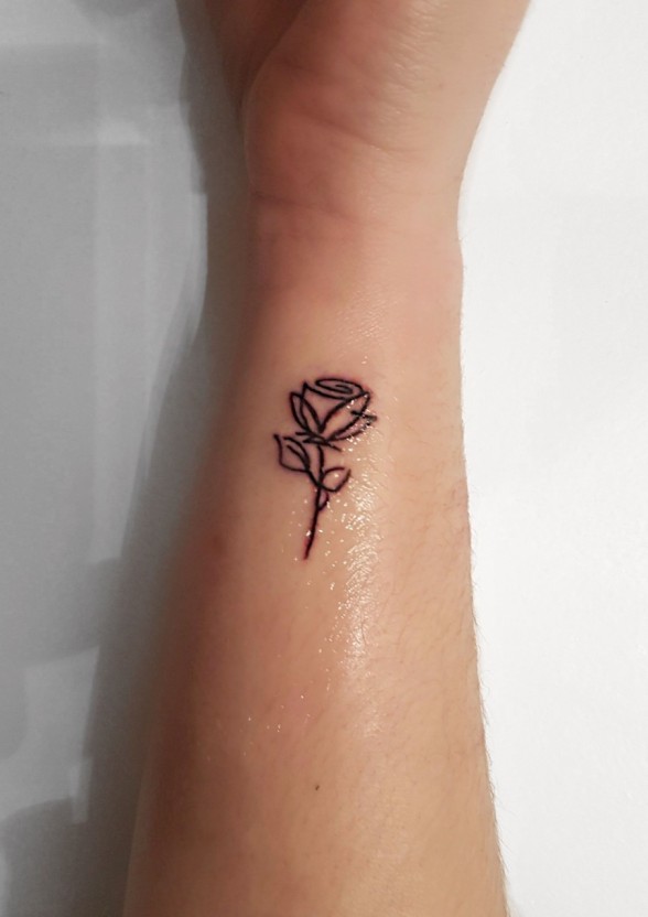 Small black rose tattoo 0016