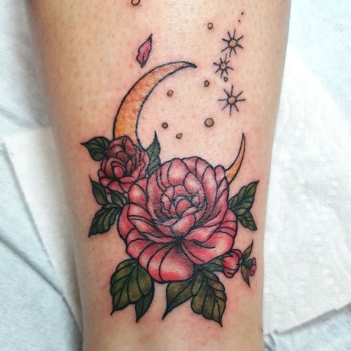 Small black rose tattoo 0029