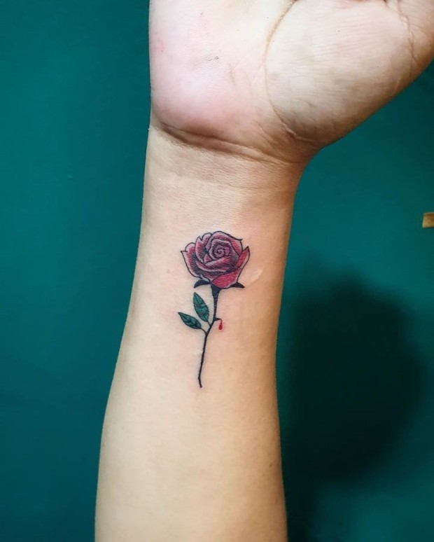 Small black rose tattoo 0031