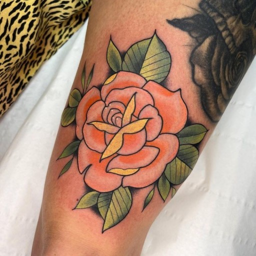 Small black rose tattoo 0033