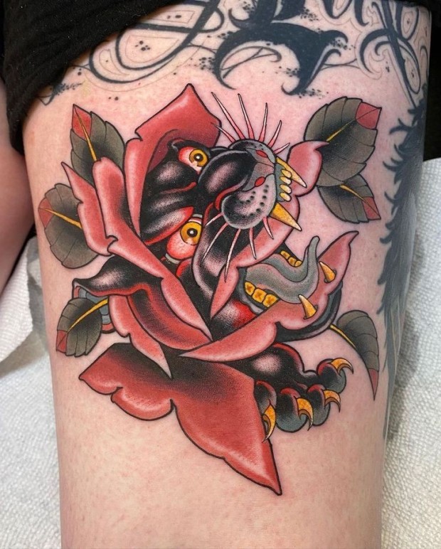 Small black rose tattoo 0049