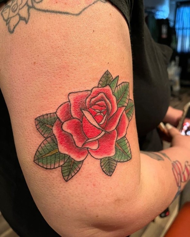 Small black rose tattoo 0053