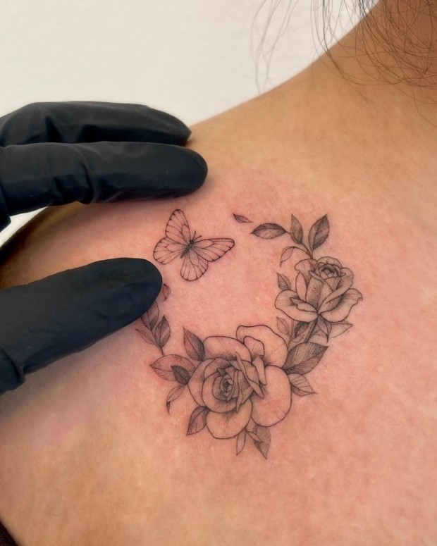 Small black rose tattoo 0054