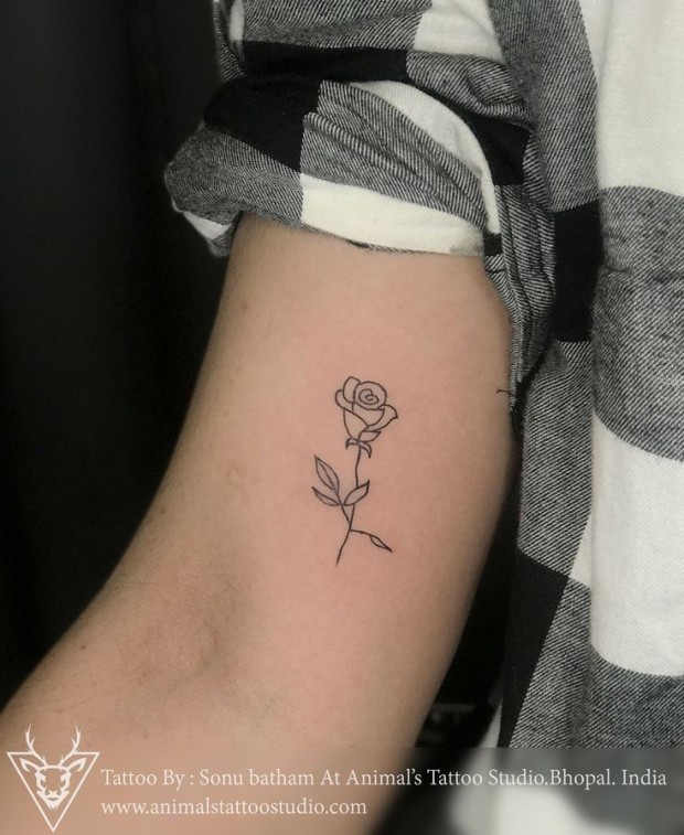 Small black rose tattoo 0055