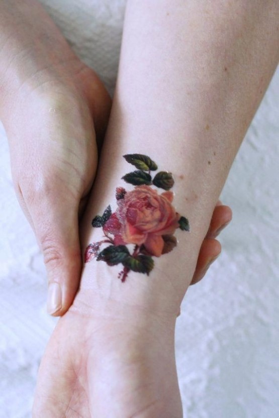 Small black rose tattoo 0056