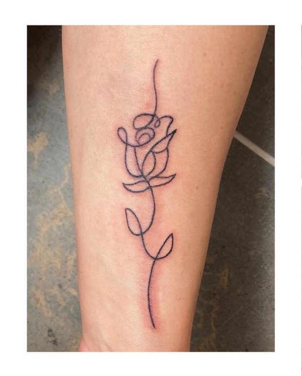 Small black rose tattoo 0063