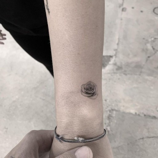 Small black rose tattoo 0064