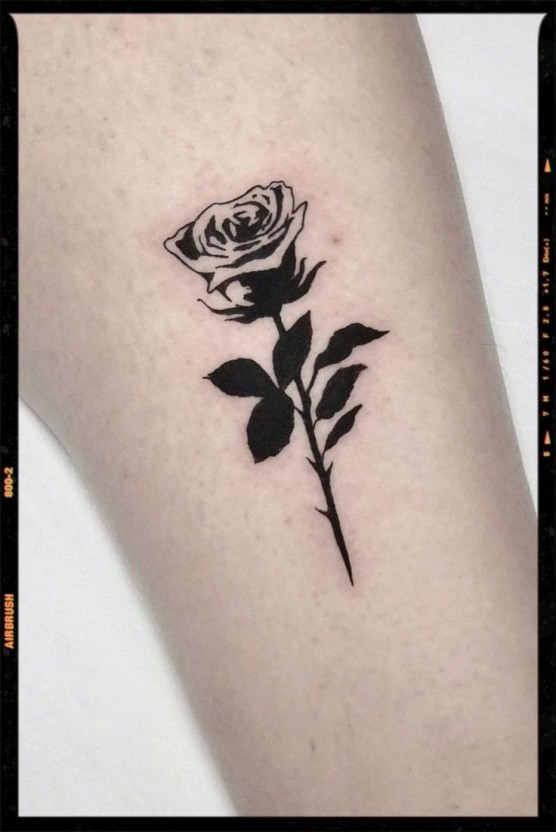 Small black rose tattoo 0066