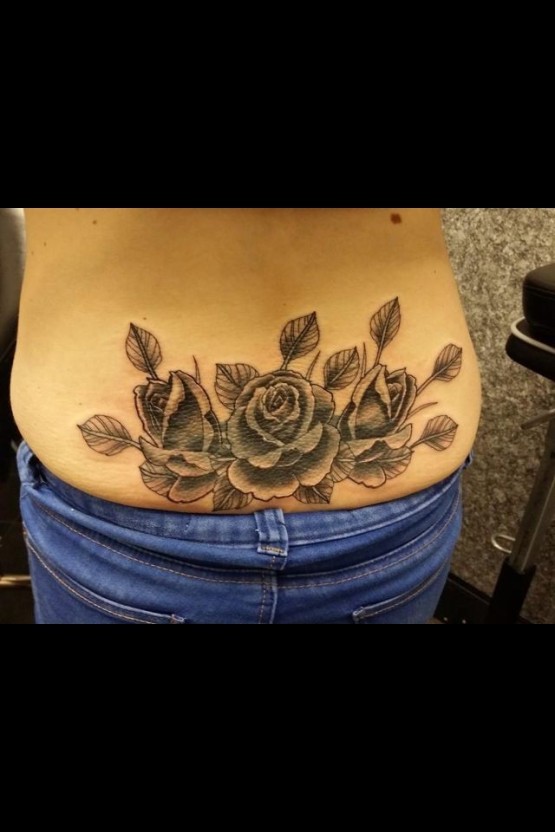 Small black rose tattoo 0070