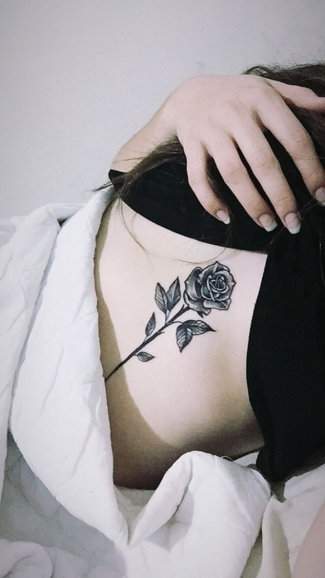 Small black rose tattoo 0071