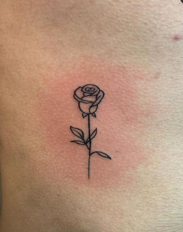 Small black rose tattoo 0075