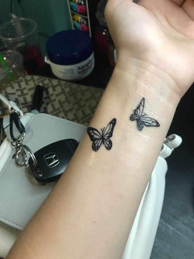 small butterfly hand tattoo 0019