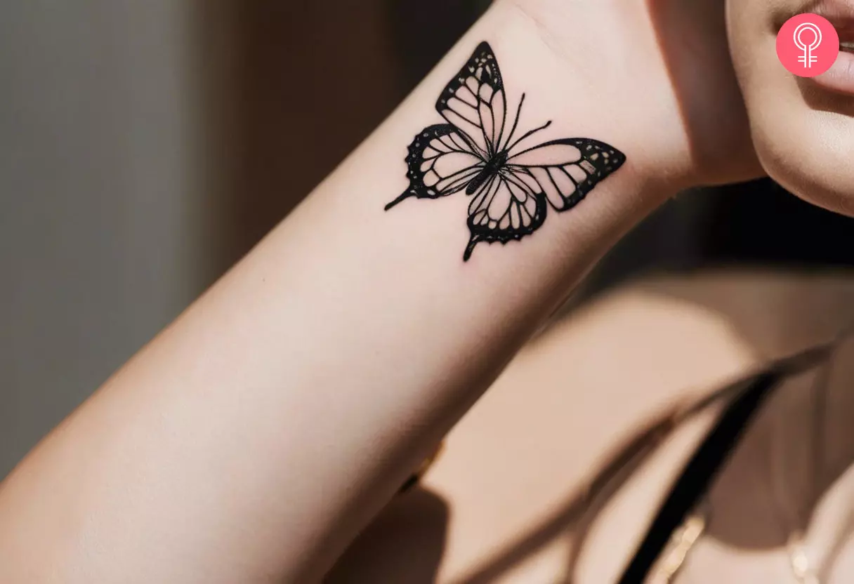 small butterfly hand tattoo 0027