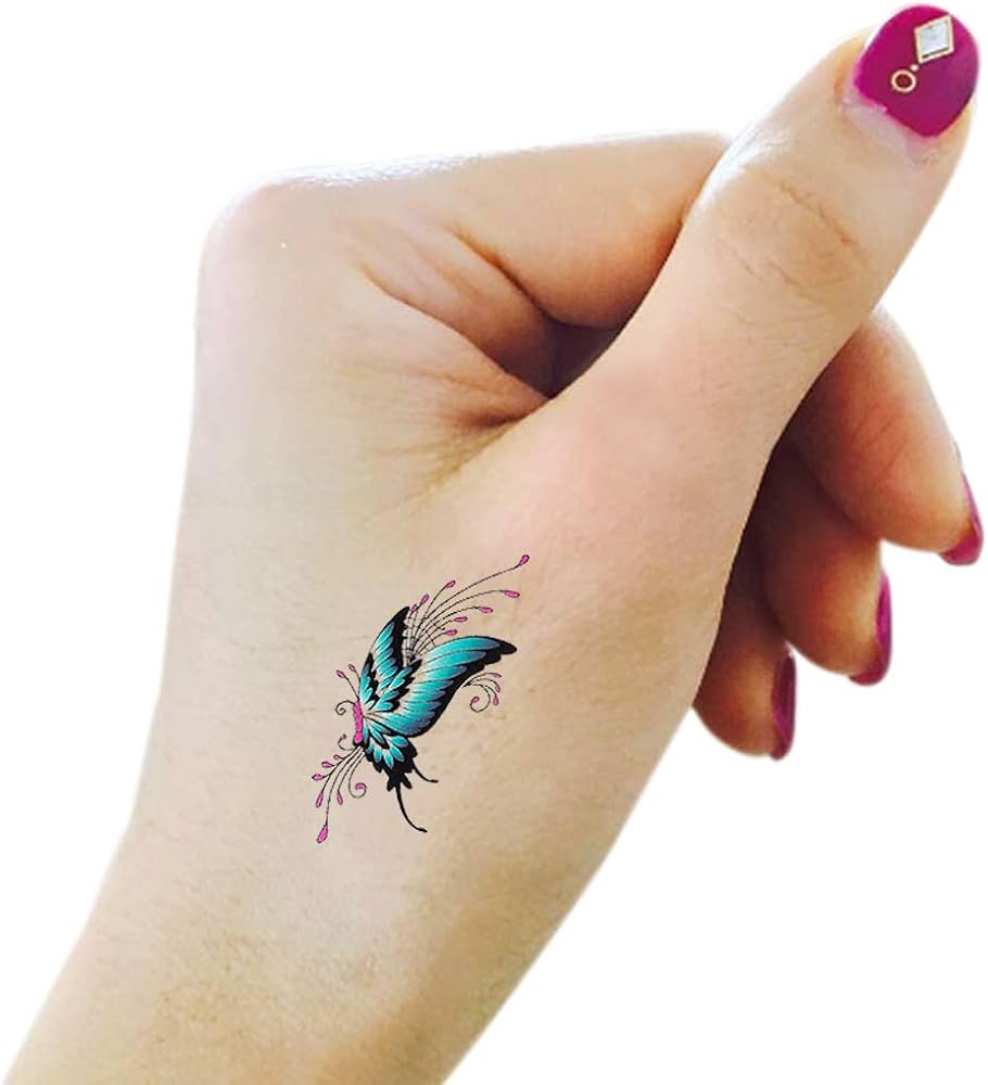 small butterfly hand tattoo 0049