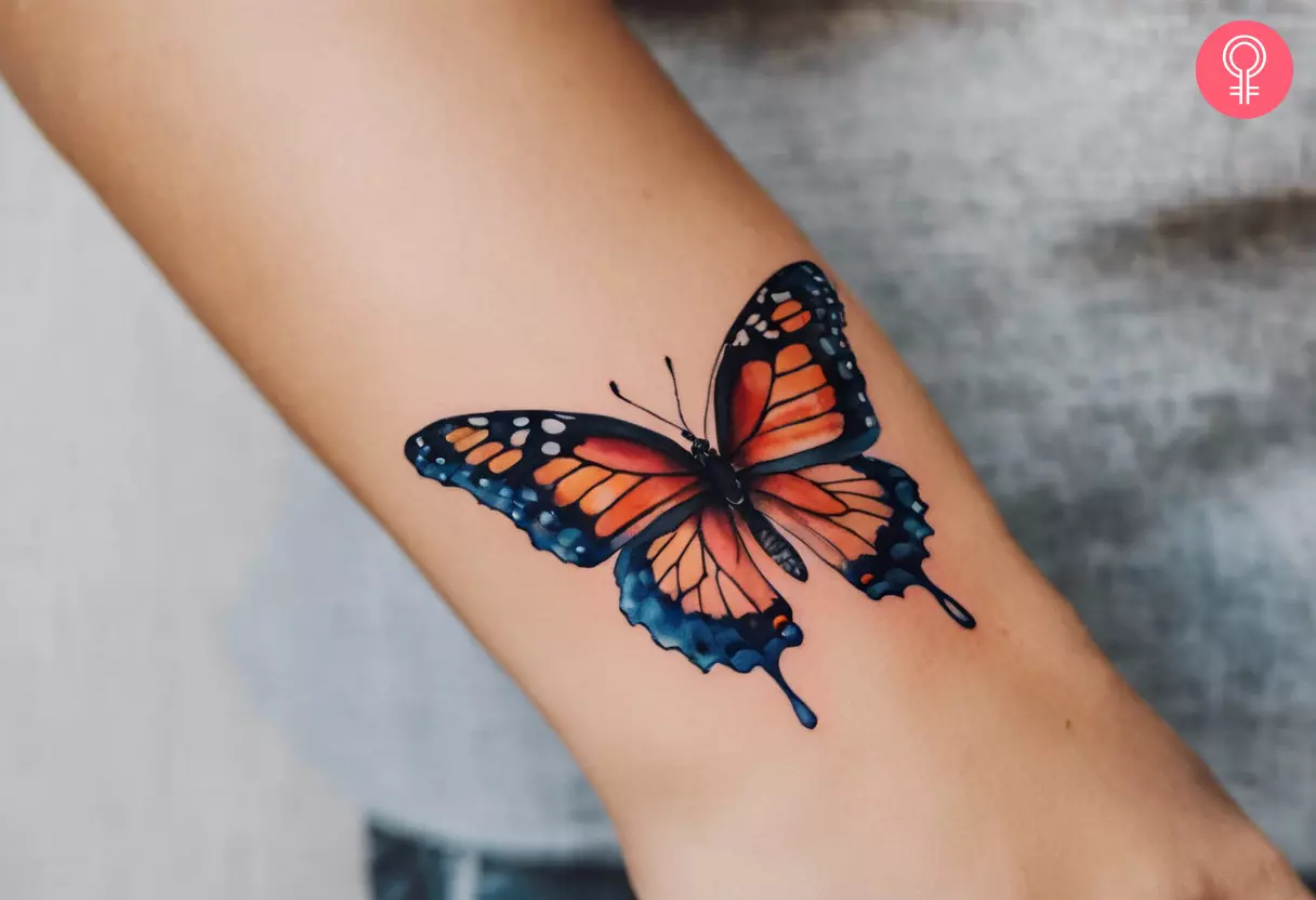 small butterfly hand tattoo 0055