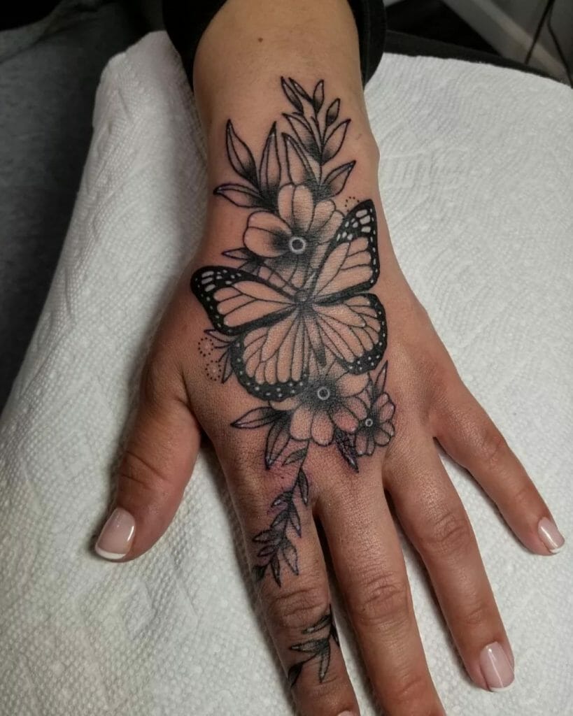 small butterfly hand tattoo 0056