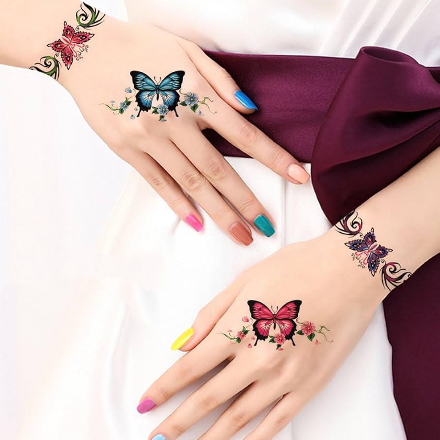 small butterfly hand tattoo 0065