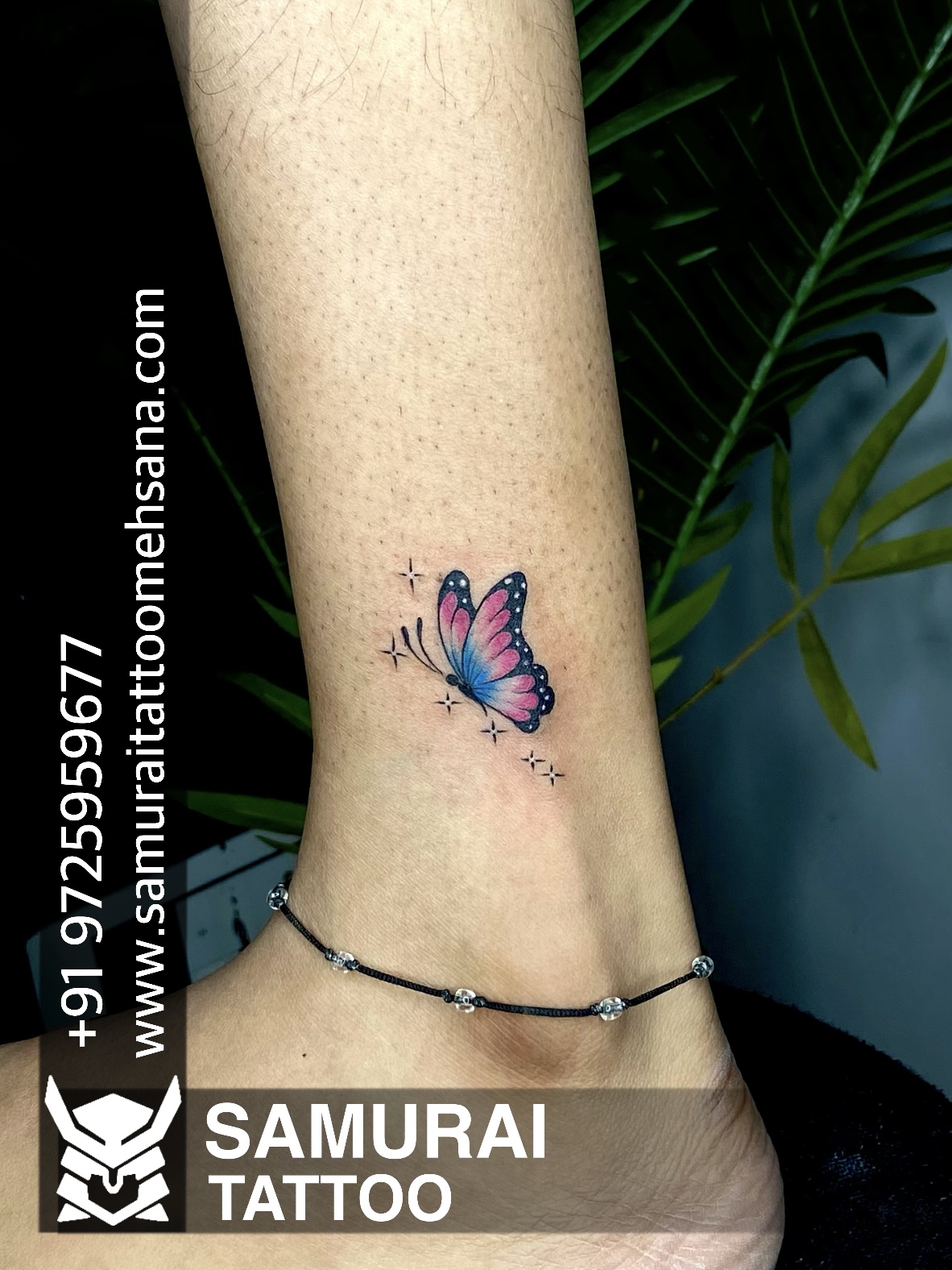 small butterfly hand tattoo 0082