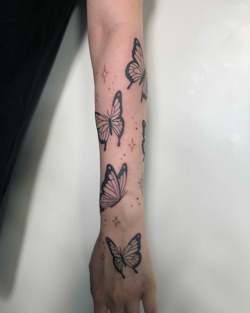 small butterfly hand tattoo 0090