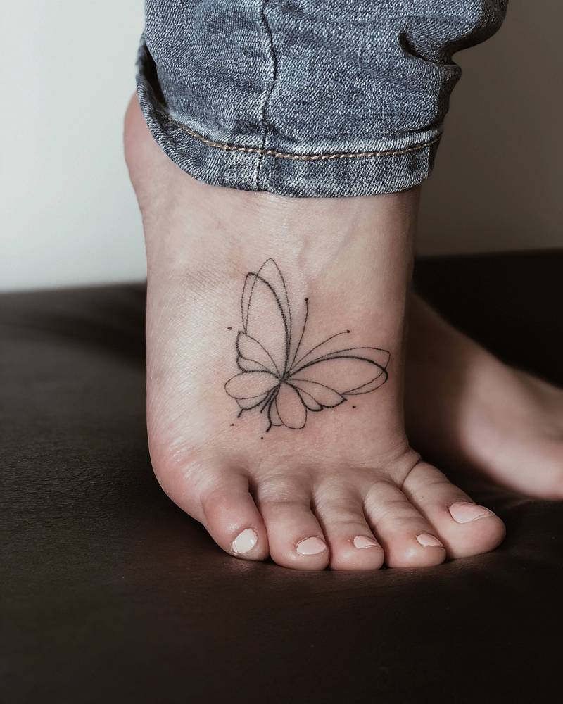 small butterfly hand tattoo 0096