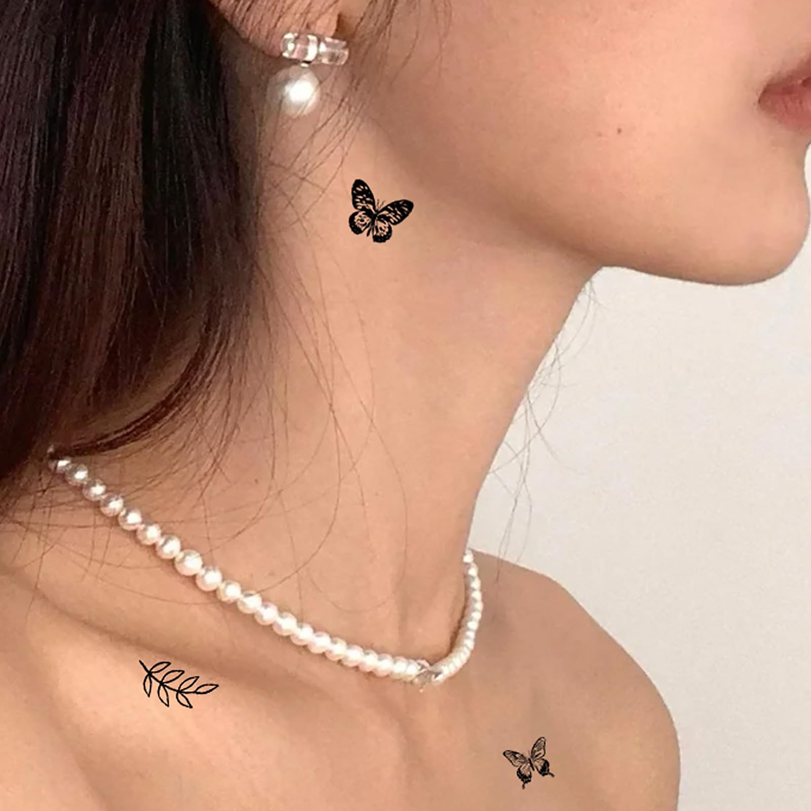 small butterfly neck tattoo 0035