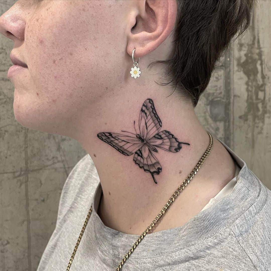 small butterfly neck tattoo 0038