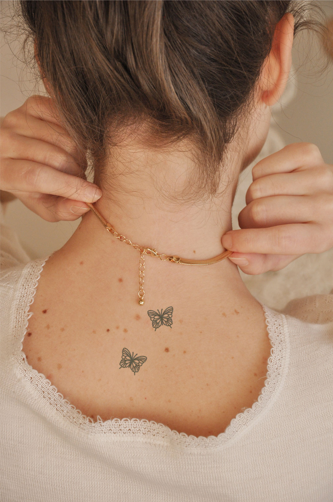 small butterfly neck tattoo 0040