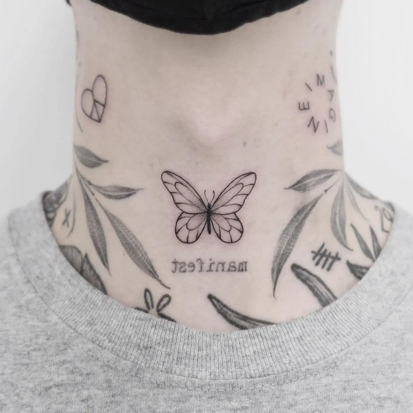 small butterfly neck tattoo 0048