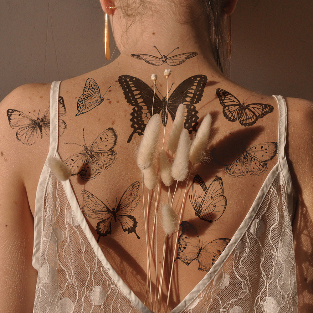 small butterfly neck tattoo 0054