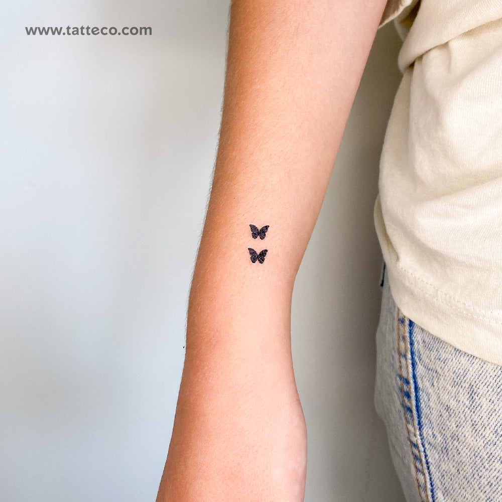 small butterfly neck tattoo 0058