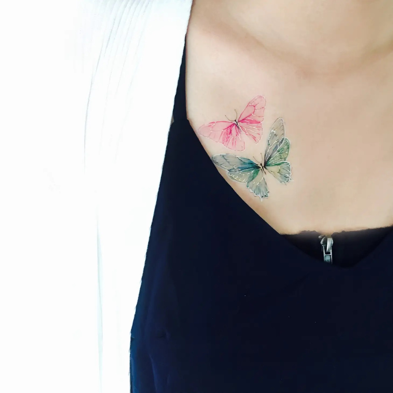 small butterfly neck tattoo 0079