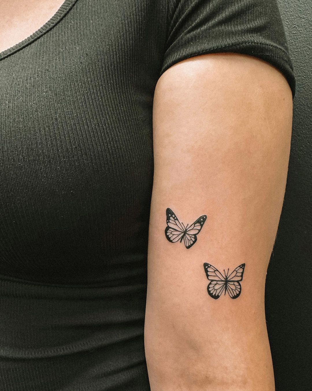 small butterfly neck tattoo 0085