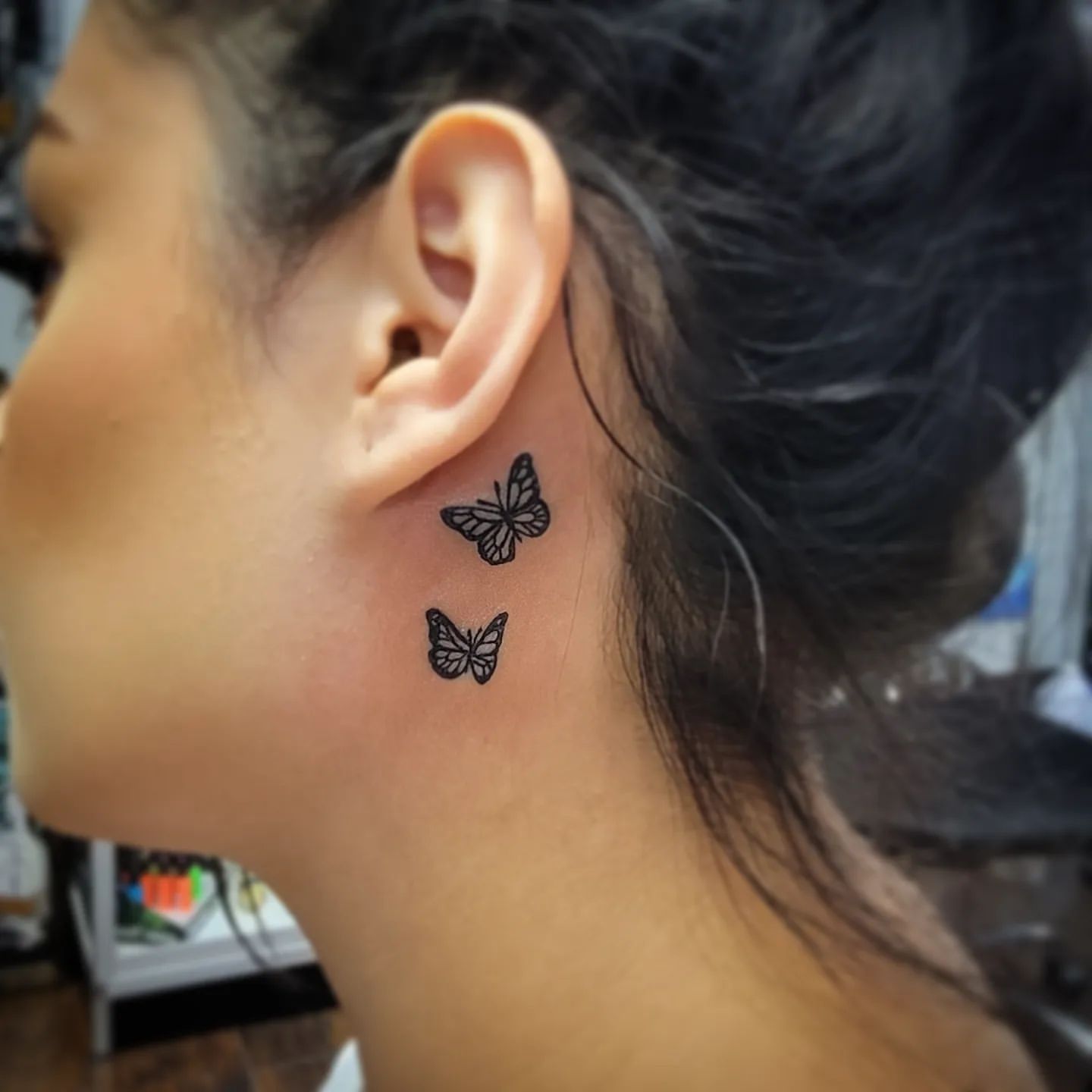 small butterfly neck tattoo 0087