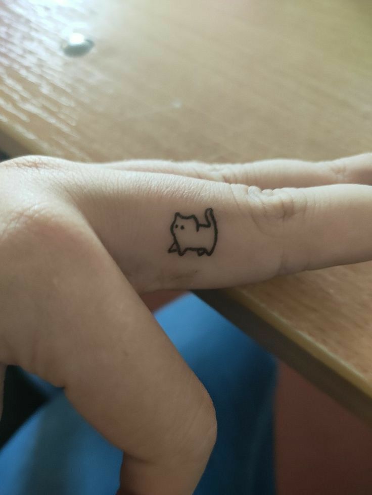 small cat tattoo