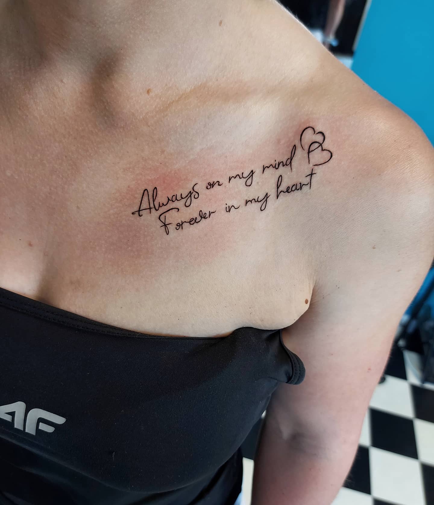 small chest quote tattoo 0020