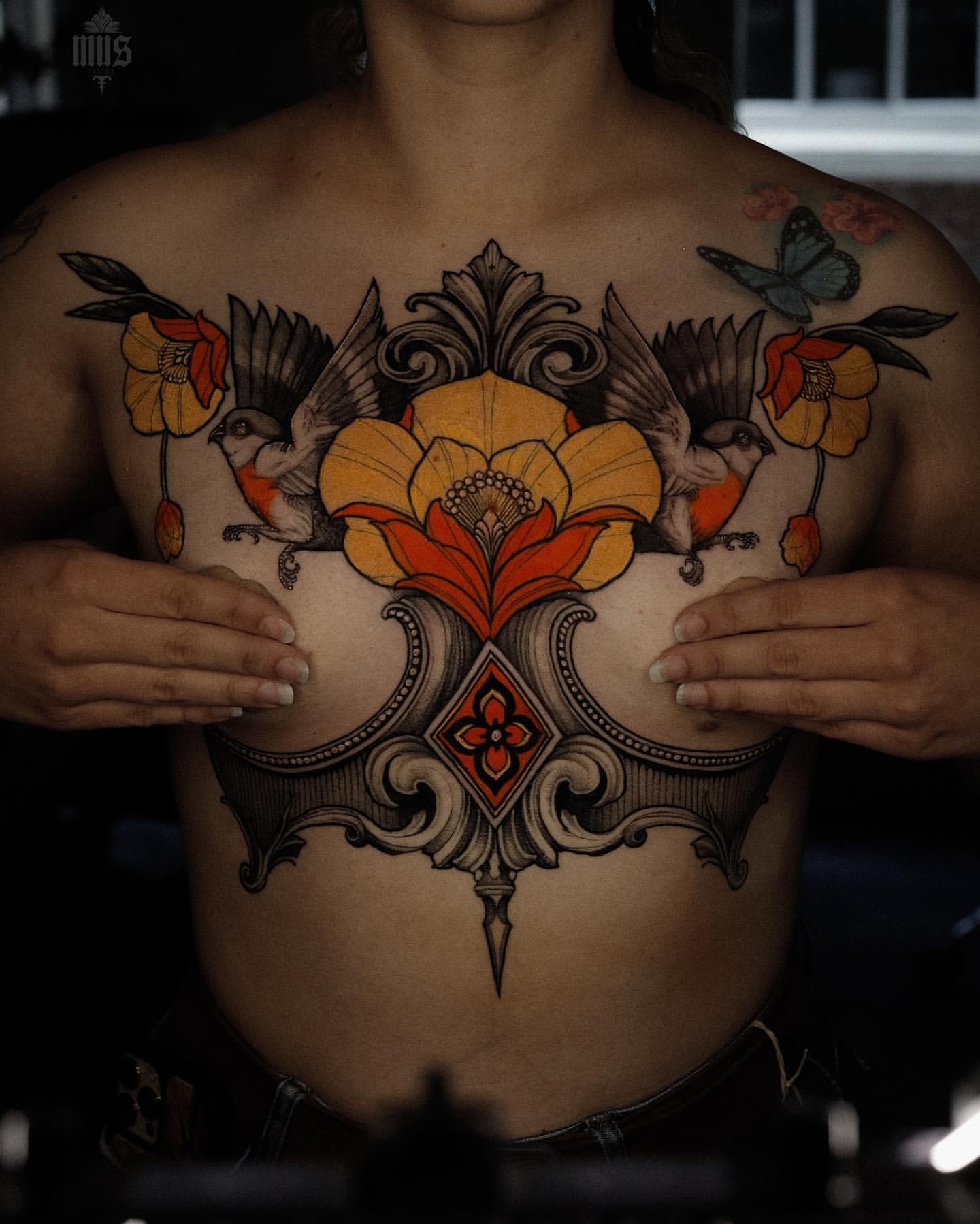 Small chest tattoo 0092