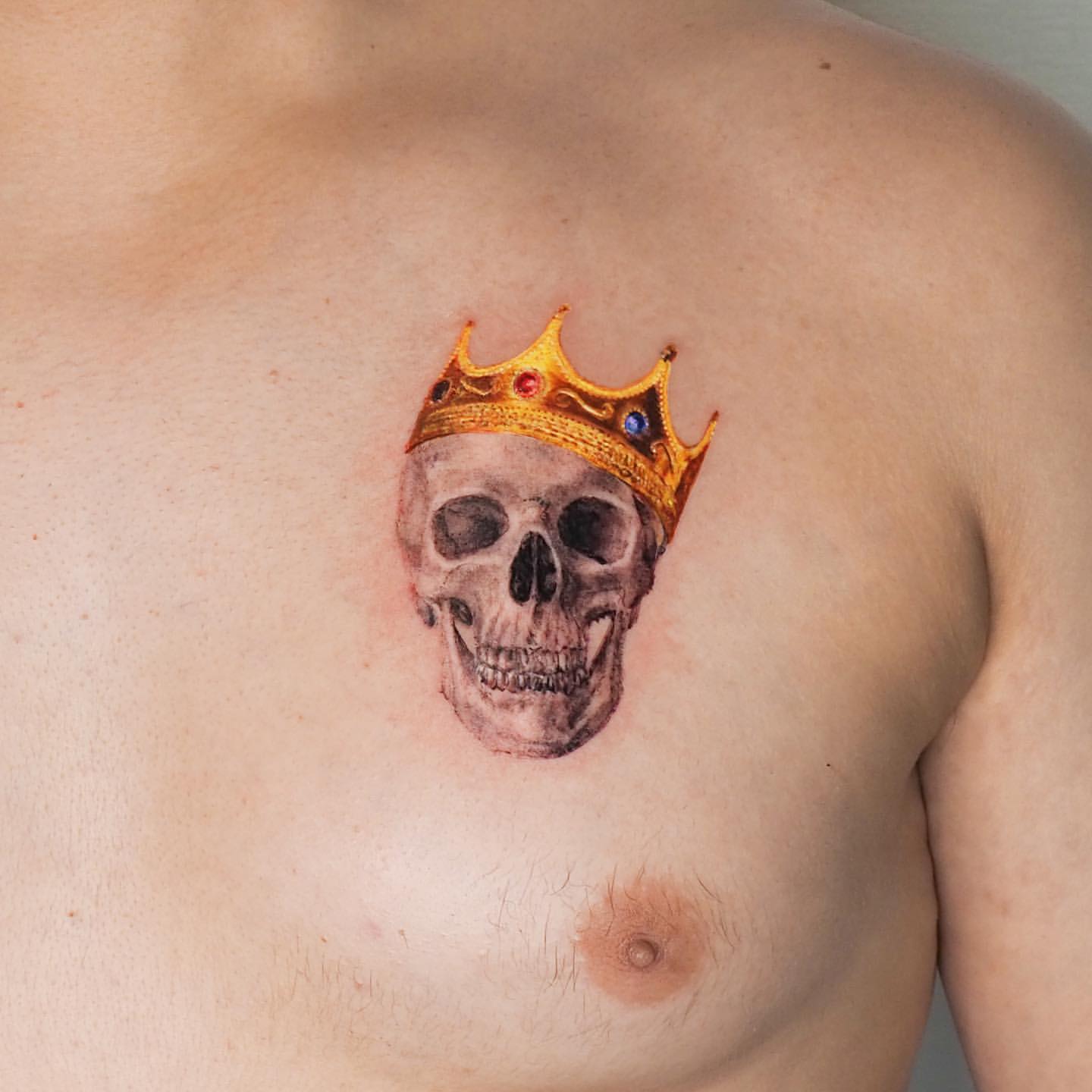 Small chest tattoo 0098