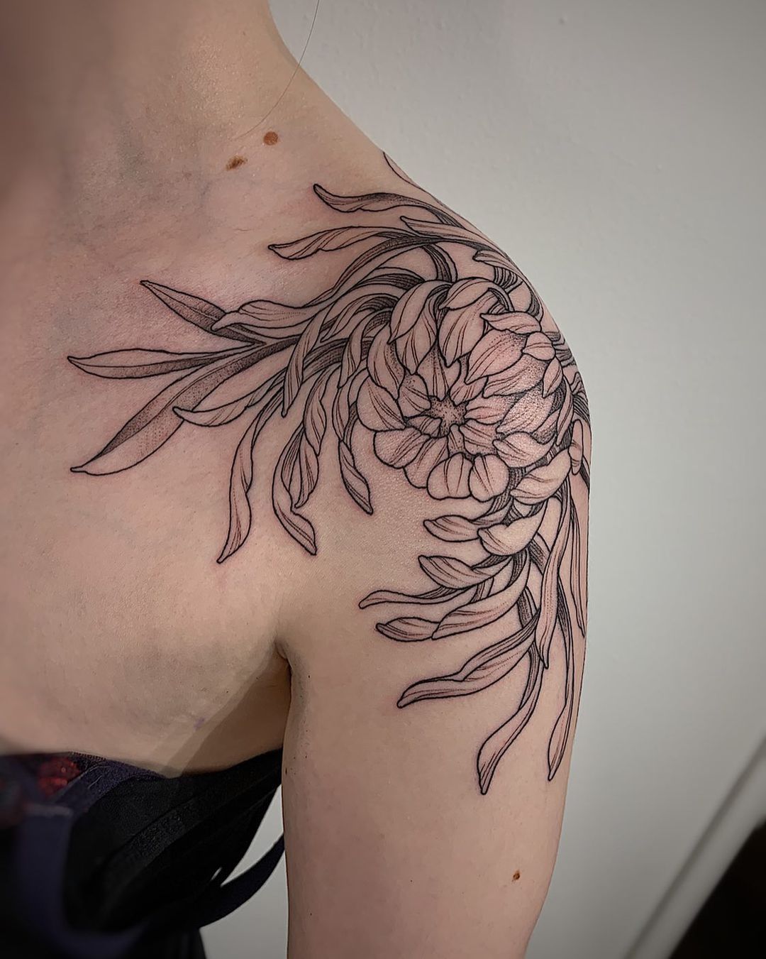 Small chrysanthemum tattoo meaning