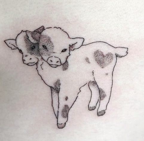 small cow tattoo designs