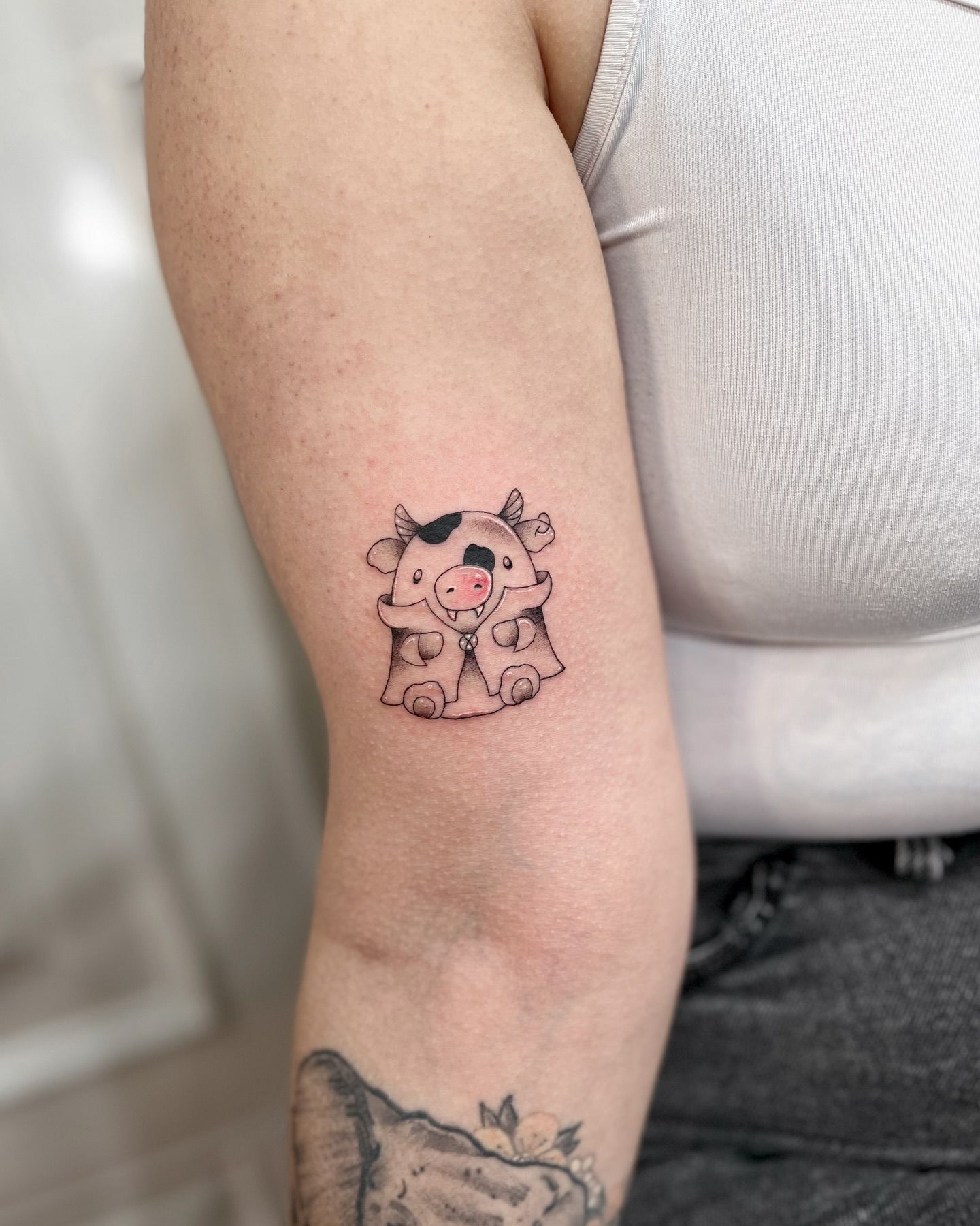 small cow tattoo 0012