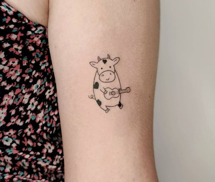 small cow tattoo 0017