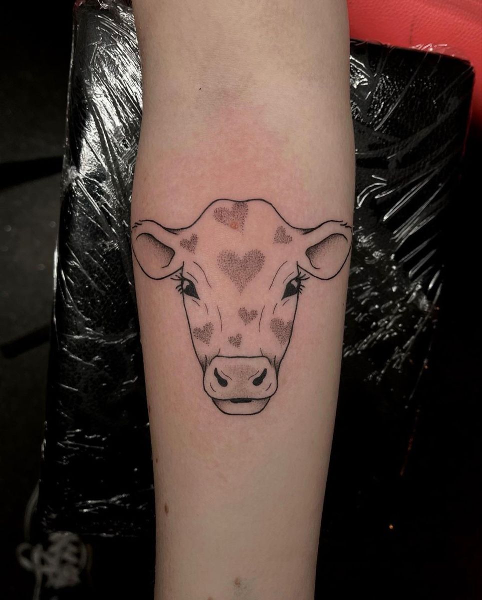 small cow tattoo 0025