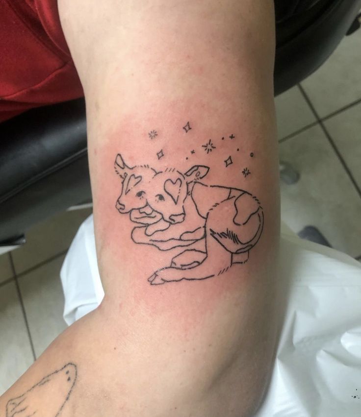 small cow tattoo 0034