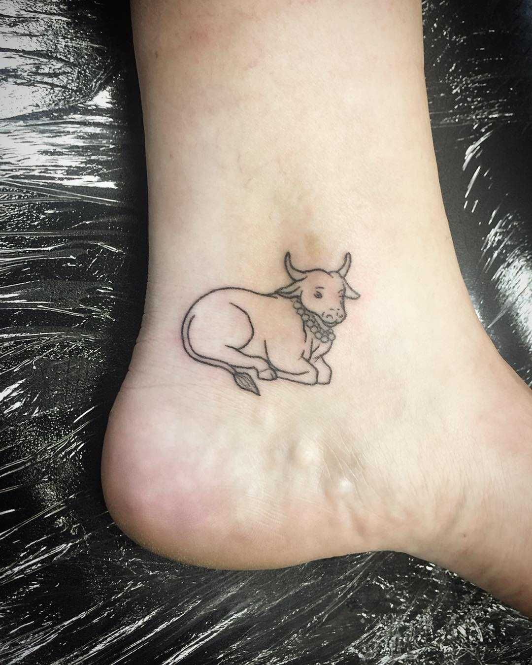 small cow tattoo 0056