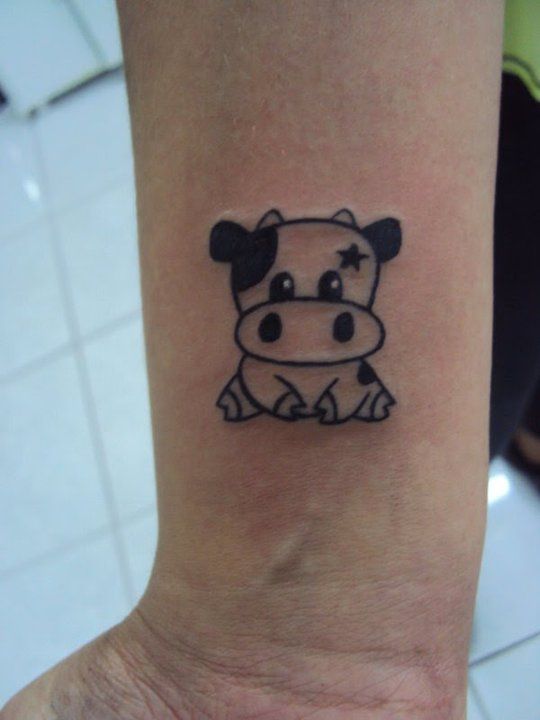 small cow tattoo 0092