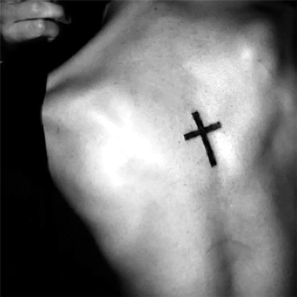 small cross face tattoo 0014