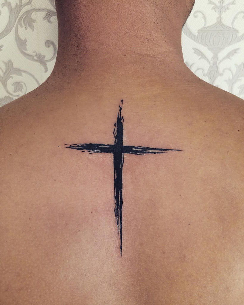 small cross face tattoo 0044